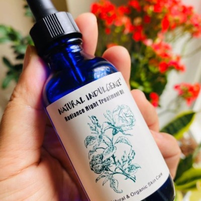 Natural Indulgence有机亮颜夜间修护面油图1